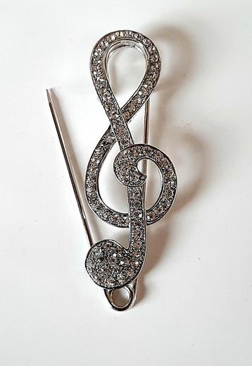 Muzieksleutel sierspeld zilverkleurig met strass 8 cm beschikbaar voor biedingen