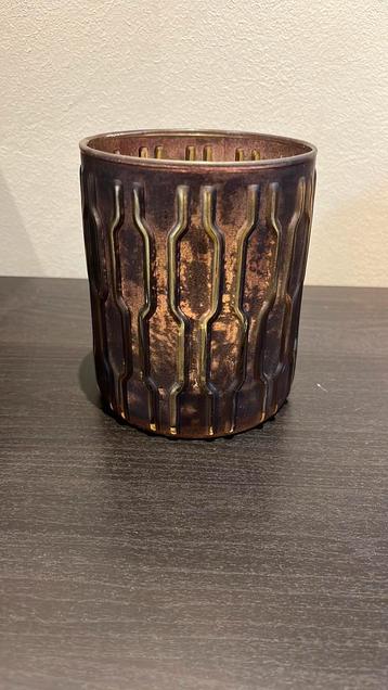 Bruin-gouden waxinelichthouder beschikbaar voor biedingen