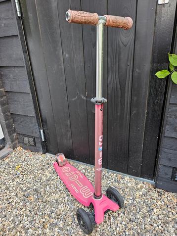 Roze maxi micro step beschikbaar voor biedingen