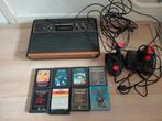 Vintage Atari spelcomputer met games en controllers, Spelcomputers en Games, Spelcomputers | Atari, Met 2 controllers, Ophalen of Verzenden