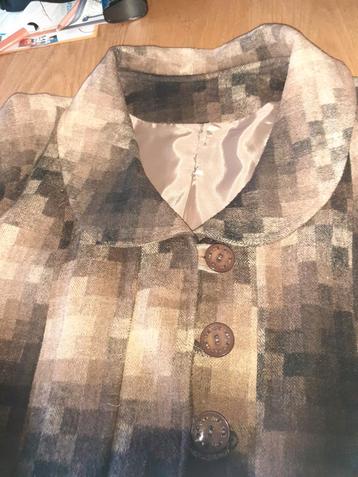 Mooie   bruine  winterjas. Maat  44 beschikbaar voor biedingen