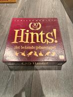 Hints! Jubileumeditie - Gebarenspel, Hobby en Vrije tijd, Gezelschapsspellen | Bordspellen, Drie of vier spelers, Ophalen of Verzenden