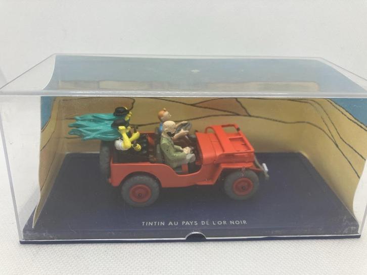 96954: Kuifje en het zwarte goud - De rode Jeep op de cover, Hobby en Vrije tijd, Modelauto's | 1:43, Zo goed als nieuw, Auto