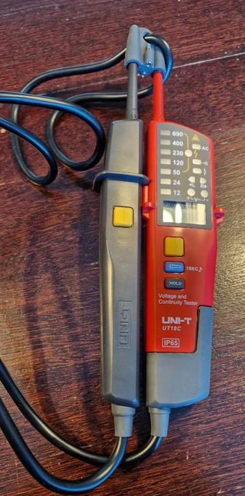 Uni-T UT18C duspol spanningsmeter. beschikbaar voor biedingen
