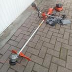 Husqvarna professionele accu bosmaaier, Tuin en Terras, Grasmaaiers, Cirkelmaaier, Gebruikt, 50 cm of meer, Ophalen