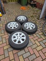 Continental winterbanden volvo c30 v40 etc, Auto-onderdelen, Ophalen, Gebruikt, 15 inch, Banden en Velgen