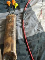 Pijl en boog zuignappen, Ophalen