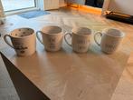 4 witte mokken met teksten, Huis en Inrichting, Keuken | Servies, Ophalen of Verzenden, Gebruikt, Overige stijlen, Kop(pen) en/of Schotel(s)
