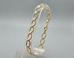 Goud op zilver fantasie schakel armband. 2025/504