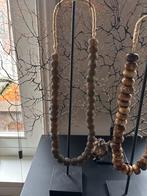 Afrikaanse kettingen op standaard - chique interieur, Bruin, Ophalen of Verzenden, Zo goed als nieuw, Overige materialen