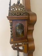 Antieke zaanse klok, Ophalen