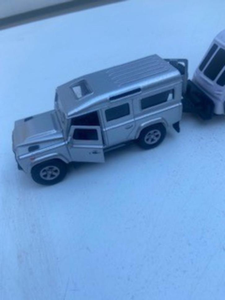 Landrover Defender + caravan, Hobby en Vrije tijd, Modelauto's | 1:24, Gebruikt, Auto, Overige merken, Ophalen