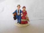 IT  Man met Koffers en Vrouw met Paraplu  60D, Diversen, Kerst, Ophalen of Verzenden, Zo goed als nieuw