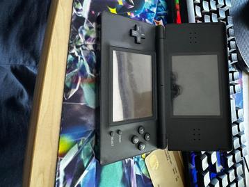 zwarte nintendo ds met spellen beschikbaar voor biedingen
