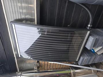 Zonnecollector voor zwembad. 1 zomer gebruikt  beschikbaar voor biedingen