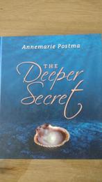 Annemarie Postma - The Deeper Secret, Boeken, Annemarie Postma, Ophalen of Verzenden, Zo goed als nieuw