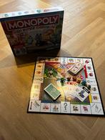 Bordspel - Mijn eerste Monopoly, Hobby en Vrije tijd, Gezelschapsspellen | Bordspellen, Ophalen of Verzenden, Zo goed als nieuw