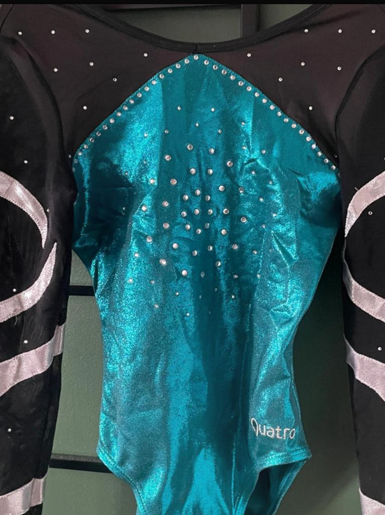 Turnpakje quatro, Kindermaat 146 t/m 176, Ophalen of Verzenden, Zo goed als nieuw, Turnpak(je)