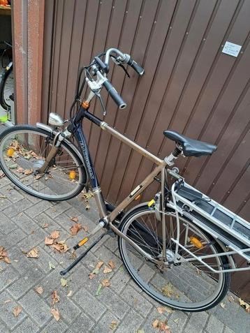 Nette electrische batavus herenfiets met nieuwe accu beschikbaar voor biedingen