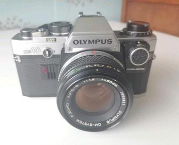 Olympus OM10 inclusief 50mm 1:1.8 lens en manual adapter  beschikbaar voor biedingen