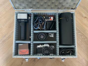 Olympus OM10 spiegelreflex camera met lenzen & accessoires beschikbaar voor biedingen