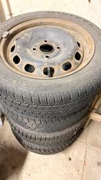 4 stalen velgen 15″ + winterbanden (195/50R15) en wieldoppen, Ophalen, Gebruikt