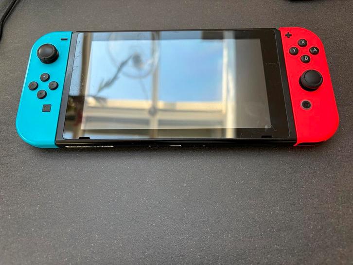 Nintendo Switch V1 met 6 games en accessoires, Spelcomputers en Games, Games | Nintendo Switch, Gebruikt, Overige genres, 3 spelers of meer