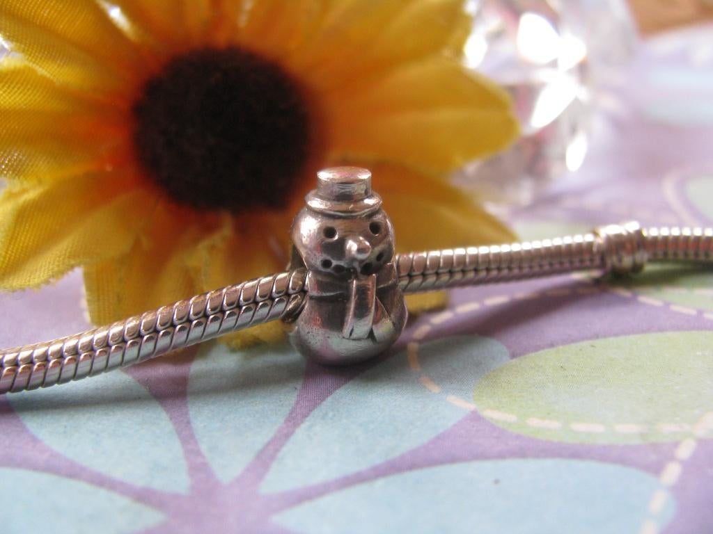 Pandora bedel P023 = sneeuwpop, Sieraden, Tassen en Uiterlijk, Bedels, Pandora, Ophalen of Verzenden, Zo goed als nieuw, 1 bedel