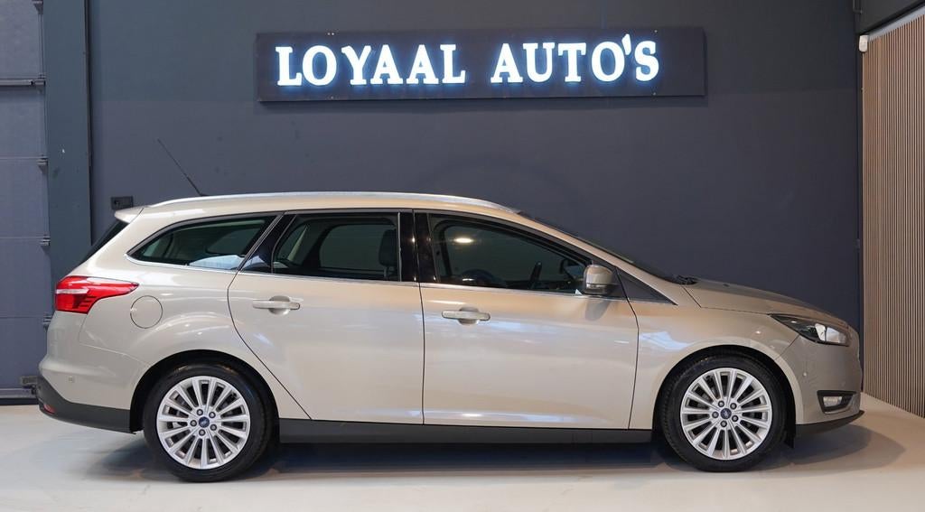 Ford Focus Wagon 1.0 Titanium | NAVI | AIRCO | CRUISE | TREK, Gebruikt, Euro 6, Origineel Nederlands, Handgeschakeld