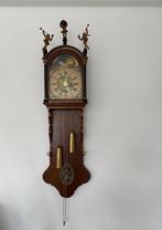 Friese klok., Ophalen