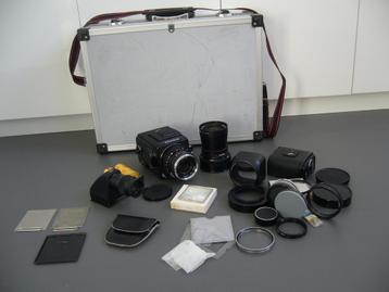 Hasselblad 500 C/M met Carl Zeiss Planar en Carl Zeiss Dista beschikbaar voor biedingen