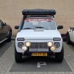 Lada Niva 1.7 I 21214 4WD 1996, Auto's, Stof, Traction-control, Wit, Origineel Nederlands