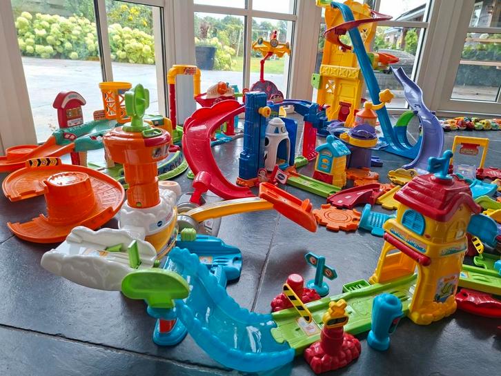 grote partij Toettoet Vtech, Kinderen en Baby's, Speelgoed | Racebanen, Gebruikt, Handmatig, Overige merken, Ophalen