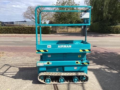 Gebruikte schaarhoogwerker op rups Airman ENCL040, Zakelijke goederen, Machines en Bouw | Liften, Steigers en Ladders
