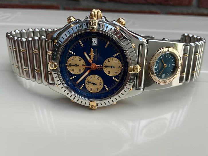 Breitling chronomat b13050.1 goud / staal UTC Rouleaux band, Sieraden, Tassen en Uiterlijk, Horloges | Heren, Zo goed als nieuw