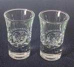 2 Schrobbelèr shotjes met logo en verzwaarde voet. H. 7 cm., Verzamelen, Glas en Borrelglaasjes, Ophalen of Verzenden, Zo goed als nieuw