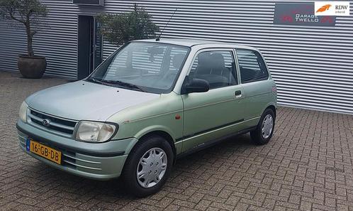 Daihatsu Cuore 1.0-12V XTi, Auto's, Daihatsu, Bedrijf, Te koop, Cuore, Airbags, Metallic lak, Startonderbreker, Trekhaak, Benzine