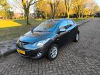 Mazda 2 1.3  84pk  5-DRS  31-12-2014  Bruin  85000km, Auto's, Mazda, Voorwielaandrijving, Stof, 4 cilinders, Bruin