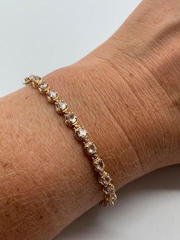 X847 Prachtige zilveren tennisarmband goudkleur beschikbaar voor biedingen