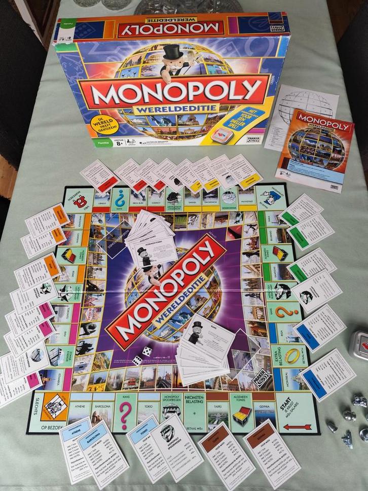 Monopoly Wereld Editie - Bordspel, mèt onderhandelknop!, Hobby en Vrije tijd, Gezelschapsspellen | Bordspellen, Zo goed als nieuw