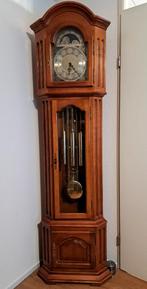 Mooie staande hoekklok, Ophalen