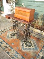 trapnaaimachine - naaimachine, Ophalen