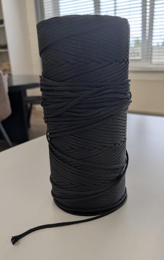 Polyester touw zwart, 5mm dik, plusminus 175 meter, Hobby en Vrije tijd, Overige Hobby en Vrije tijd, Nieuw, Ophalen of Verzenden