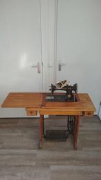 Singer naaimachine te koop, Ophalen