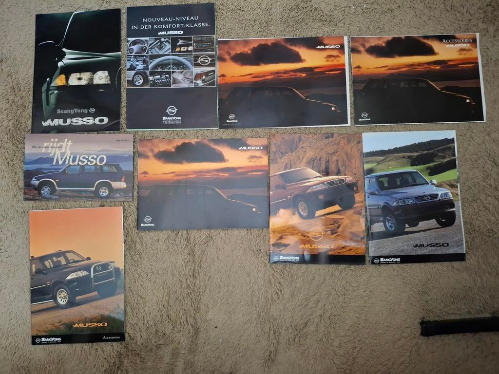 Lot autofolders SsangYong Musso, Verzenden, Gelezen, Algemeen