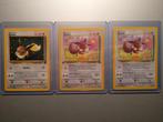 Eevee setje, 1st edition Jungle, Rocket, Legendary, Ophalen of Verzenden, Zo goed als nieuw, Meerdere kaarten