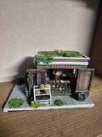 Kerstdorp mooie bloemen kraam gepimpt kersthuisjes, Ophalen of Verzenden, Zo goed als nieuw