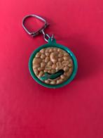 Leuke vintage sleutelhanger van een bakje pinda's., Verzamelen, Ophalen of Verzenden, Gebruikt, Merk