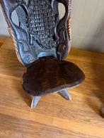 Twee afrikaanse stoelen, Ophalen