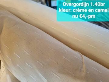 Overgordijn stof in crème en kleur camel op voorraad. €4,-pm beschikbaar voor biedingen